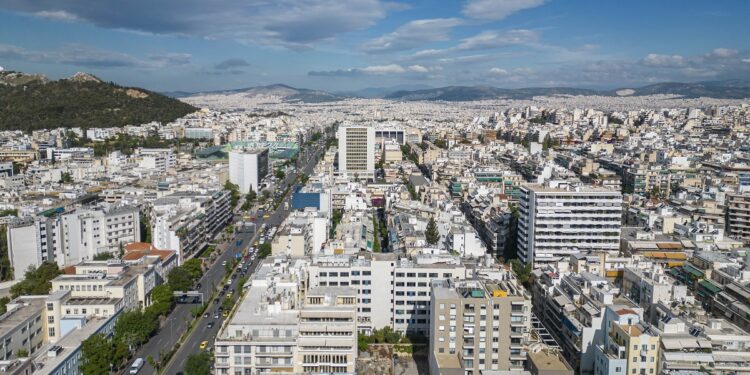 Panoramic aerial view from a drone of the urban environment of the Greek capital, Athens. Apartments, buildings and roads in central Athens near Ampelikipi and Zografou residential neighborhood  area. Athens, Greece on May 20, 2023 (Photo by Nicolas Economou/NurPhoto) (Photo by Nicolas Economou / NurPhoto / NurPhoto via AFP)